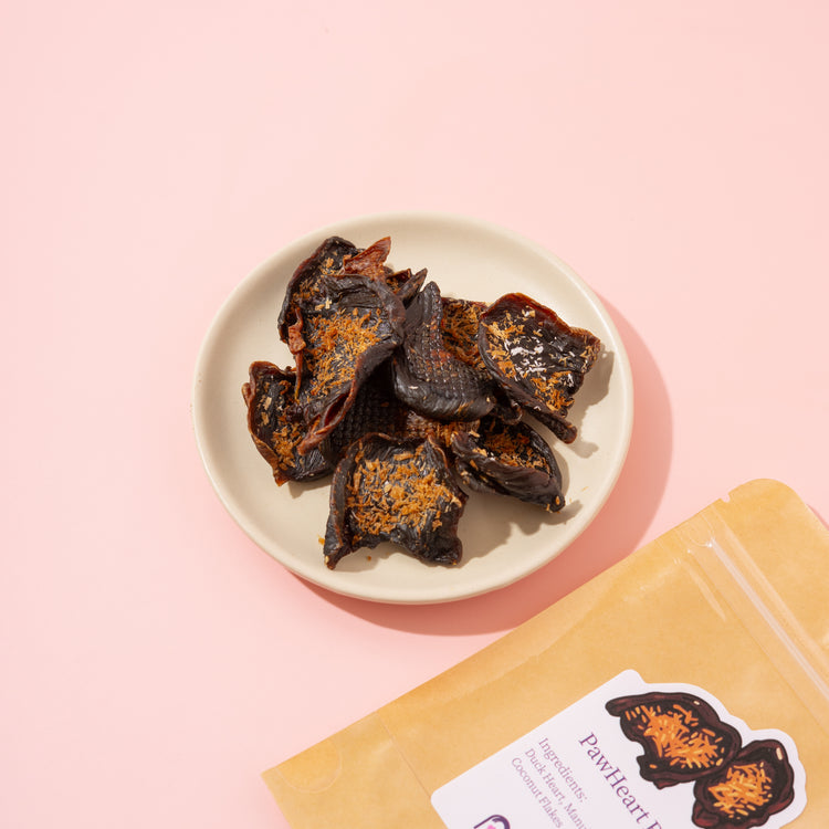 Dried pet treats on a plate with a package labeled &